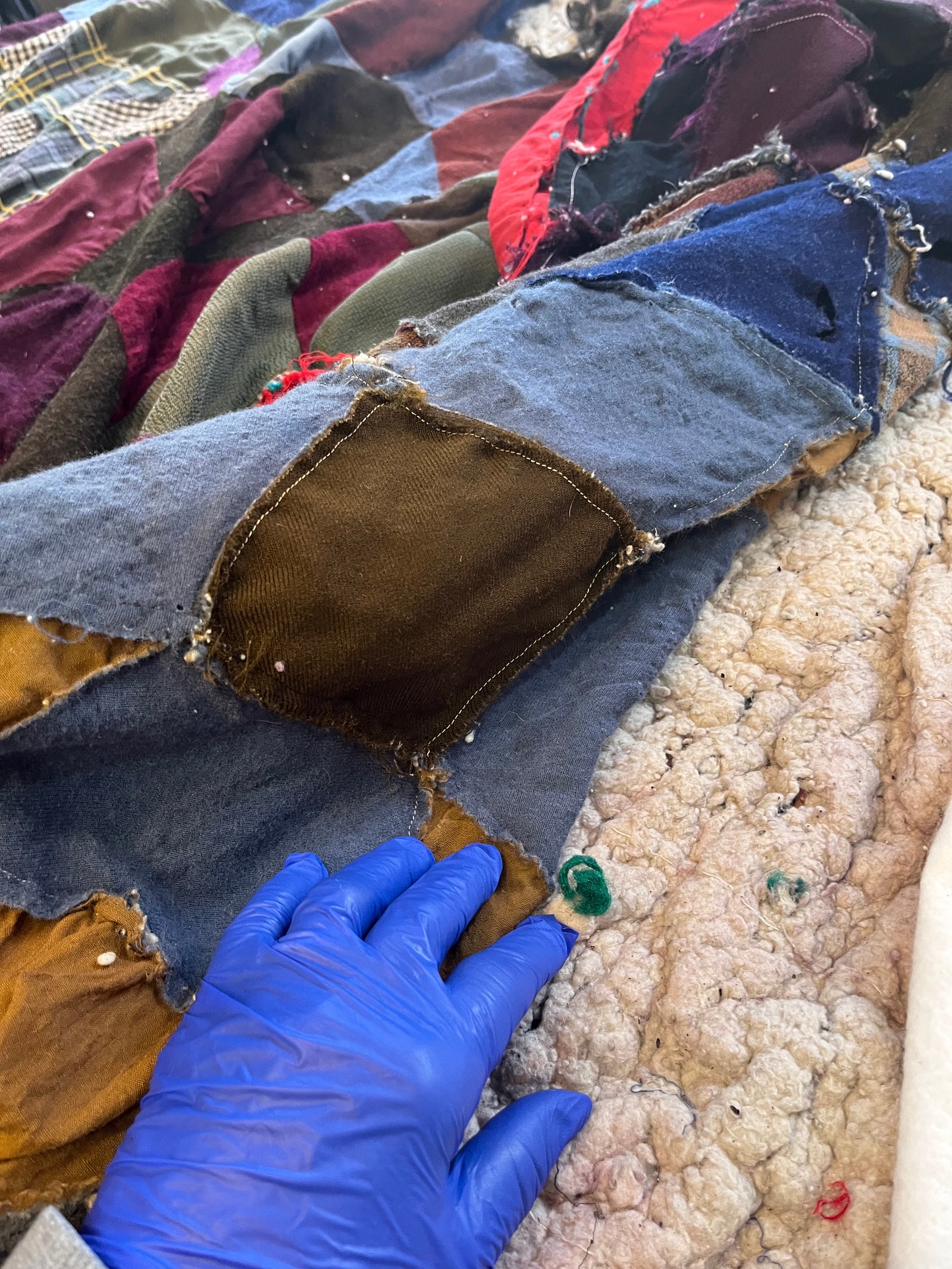 Restoration work — quilt deconstruction step