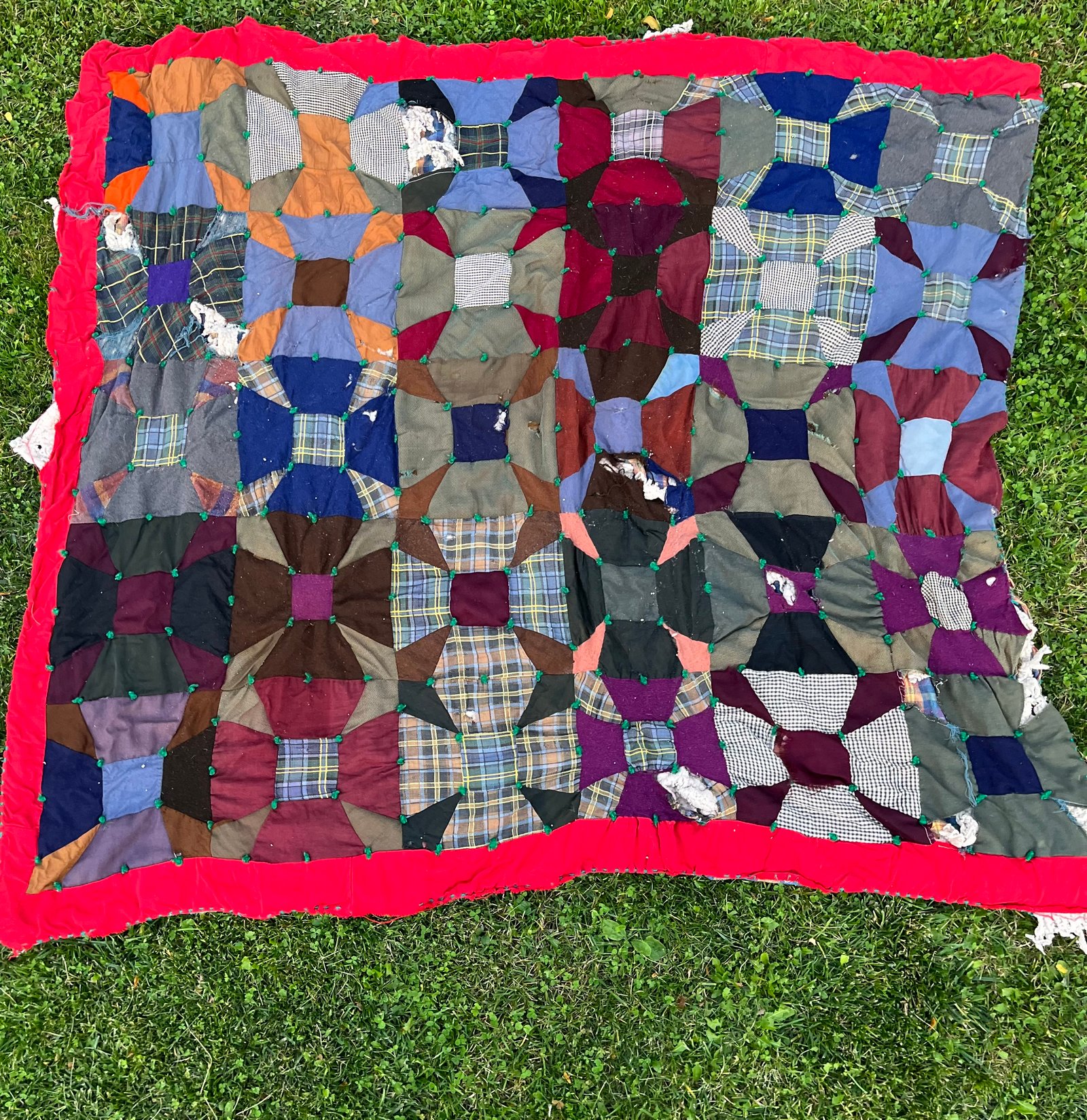 Restoration work — wool and plaid quilt before restoration